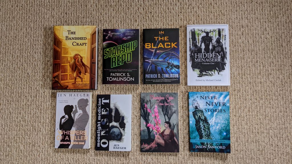 Books purchased and signed at ConFusion 2022